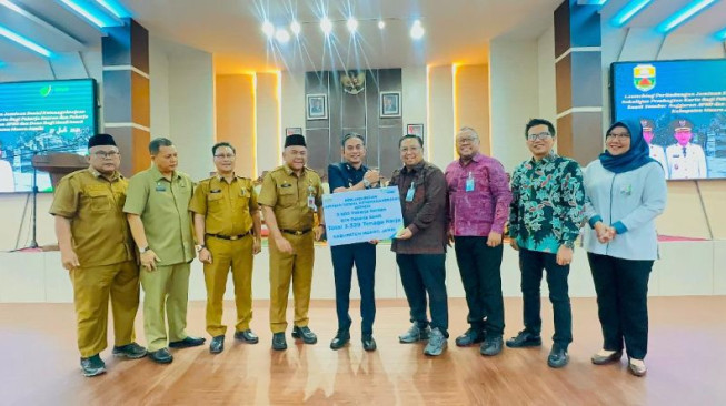 Lindungi 3.329 Pekerja Rentan dan Sawit, Pemkab Muaro Jambi Luncurkan Jaminan Sosial Ketenagakerjaan Berbasis DBH